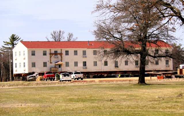 A fourth barracks building from the 1600 block at Fort McCoy, Wis., is shown being moved April 16, 2025, from the 1600 block to another area of the installation. These buildings will eventually be reset at another area of the post so new...