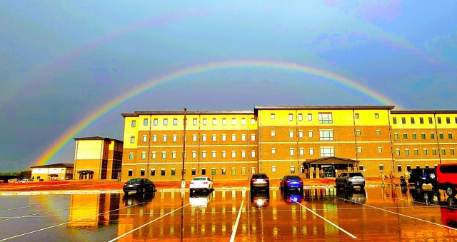 Two new transient training troops barracks are shown Sept. 12, 2023, with a rainbow in the background at Fort McCoy, Wis. The barracks is different than the traditional barracks located throughout the installation. These new buildings, built since...