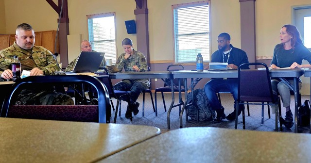 Leaders and staff from Fort McCoy, the Tomah VA Medical Center, and Volk Field, Wis., meet May 6, 2025, at Fort McCoy, Wis., to discuss medical readiness for service members, and more. The “Care Triad” as they are called meets regularly to...