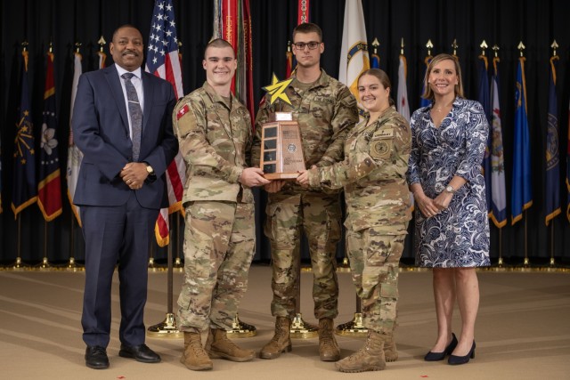 Dr. Eric Moore, Deputy to the Commanding General of U.S. Army Combat Capabilities Development Command, or DEVCOM, far left, and Beth Ferry, Director of DEVCOM Command, Control, Communications, Computers, Cyber, Intelligence Surveillance,...