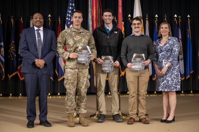 Dr. Eric Moore, Deputy to the Commanding General of U.S. Army Combat Capabilities Development Command, or DEVCOM, far left, and Beth Ferry, Director of DEVCOM Command, Control, Communications, Computers, Cyber, Intelligence Surveillance,...