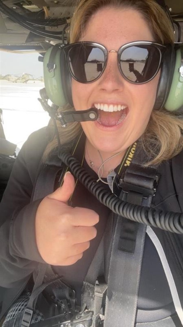 Rachel Napolitan, Chief of Public Affairs, the U.S. Army Corps of Engineers – Far East District, on a helicopter.