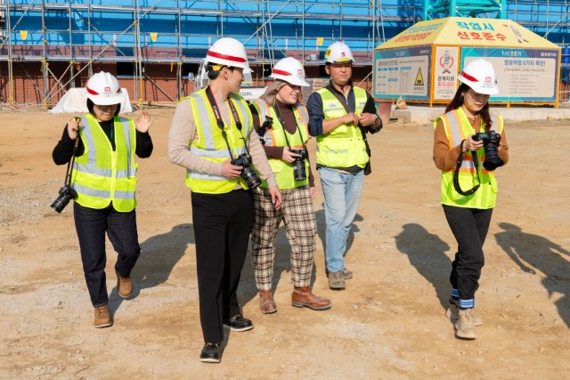 Rachel Napolitan, Chief of Public Affairs, the U.S. Army Corps of Engineers – Far East District, with her team and FED visual specialist at a project site.