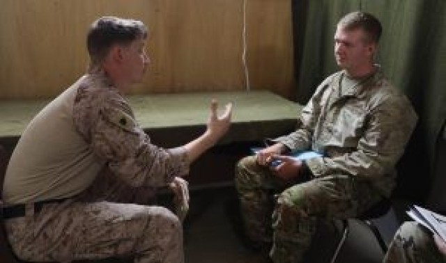 Competitors in the fourth annual Army interrogation competition, “Tranquil Storm,” conduct mass screenings of detained personnel at the Louisiana National Guard Training Center in Pineville, April 29.