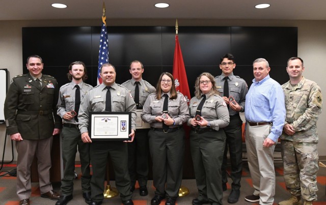 U.S. Army Corps of Engineers leaders stand with six park rangers honored for exemplary service during a recognition ceremony May 5, 2025, in Nashville, Tenn. Four received commander’s coins for their contributions to natural resource management...