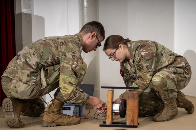 Students from Team Flying Wheels, comprised of students from The Citadel, prepare their flywheel technology to combat electromagnetic pulse attacks against drones project for presentation to the judges of U.S. Army Combat Capabilities Development...