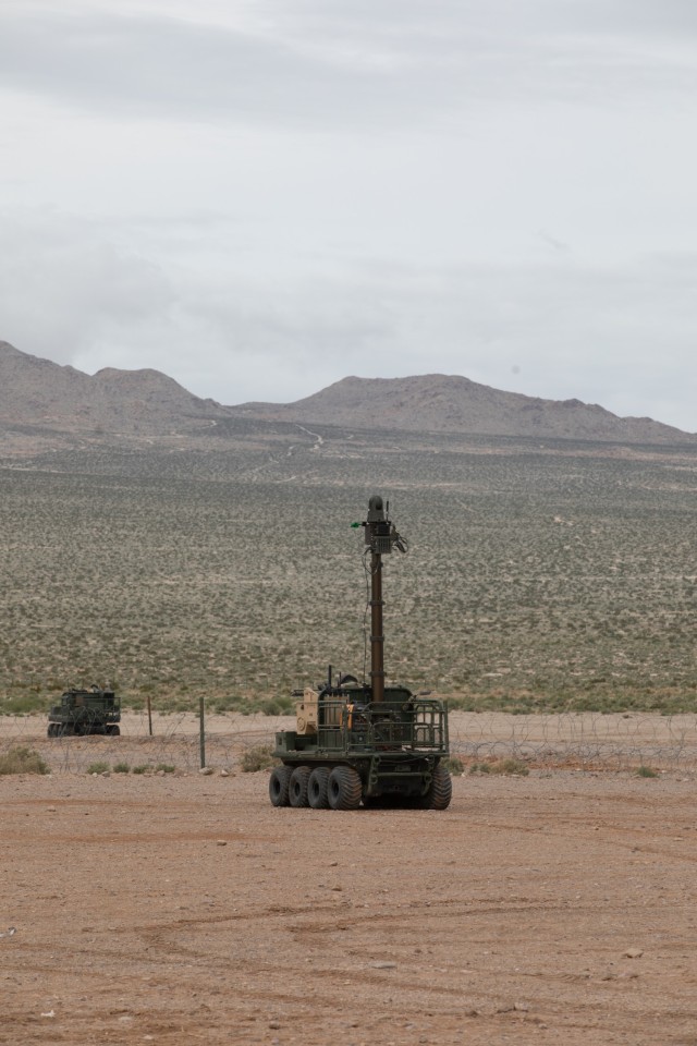 The soldiers test the family of unmanned systems (focus) in the desert.