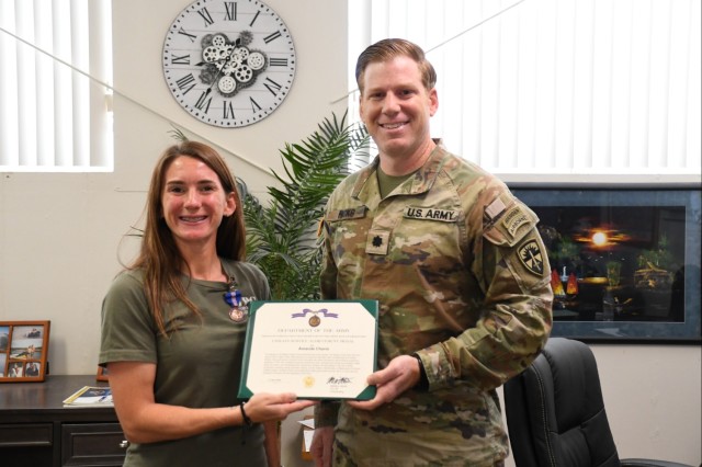 April 21, 2025, Yuma Test Center Commander Lt. Col. Kevin Hicks presented Amanda Chavis with a Civilian Service Achievement Medal for being selected as the Mission Support, Employee of the 2nd Quarter.
