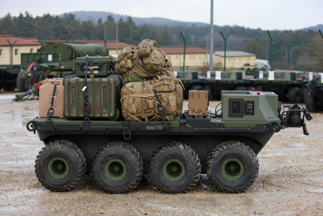 A Small Multipurpose Equipment Transport (SMET) system assigned to 3rd Brigade, 10th Mountain Division stands loaded with equipment during exercise Combined Resolve 25-1 at the Joint Multinational Readiness Center, Hohenfels Training Area,...
