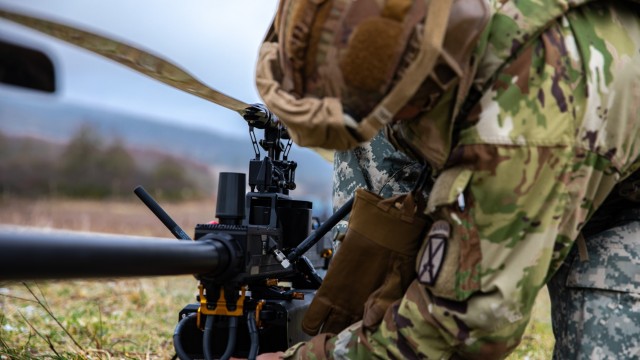 U.S. Soldiers, assigned to the 317th Brigade Engineer Battalion, 3rd Brigade Combat Team, 10th Mountain Division, set up the Ghost X medium-range reconnaissance drone during exercise Combined Resolve 25-1 at the Joint Multinational Readiness...