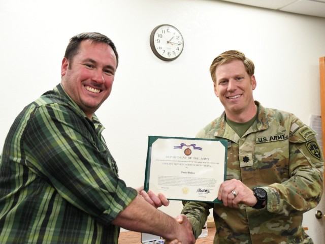 On April 8, 2025, Yuma Test Center Commander Lt. Col. Kevin Hicks presented David Bates with a Civilian Service Achievement Medal for being selected as the Mission, Employee of the 2nd Quarter.
