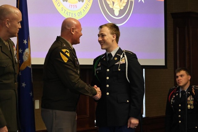 MG Phil Brooks congratulates enlistee