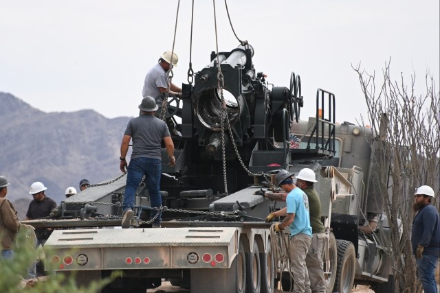 U.S. Army Yuma Proving Ground workers remove the M1 240mm howitzer that has stood sentinel since 1963 at the corner of Highway 95 and Imperial Dam Road on April 14, 2025. The iconic &#39;Big Gun&#39; was temporarily removed to facilitate...