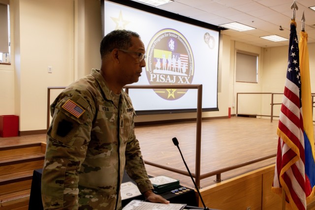 Sgt. Maj Ottoniel Rivera, the U.S. Army South, Security Cooperation Directorate Senior Enlisted Leader, addresses distinguished guests and students during the Programa Integral para Suboficiales de Alta Jerarquia 20 (PISAJ-20) closing ceremony at...