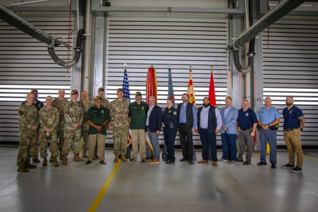 Leaders and law enforcement personnel from Fort Eisenhower and surrounding agencies gather for a group photo following the National Police Week opening ceremony at Fire Station 1, May 12, 2025. Representatives from the Department of the Army...
