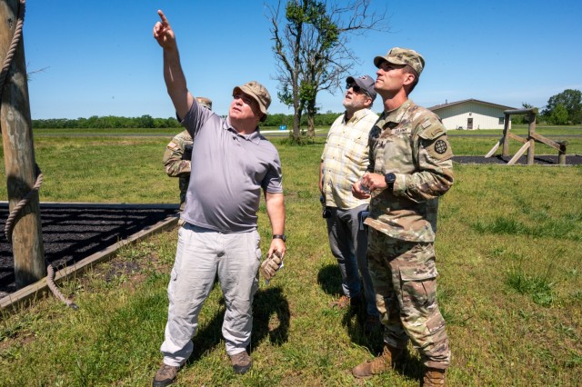 Craig Reeves, U.S. Army Fort Leonard Wood Garrison Safety specialist, points out a potential hazard to 1st Lt. Tanner McNutt, Camp Crowder’s operations supervisor, during a safety inspection May 20 at Camp Crowder’s obstacle course. Camp...