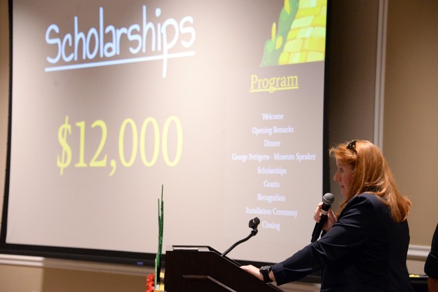 Fort Leavenworth Spouses' Club Scholarship Chairperson Laura Brown recognizes scholarship recipients during the FLSC “End of the Yellow Brick Road”-themed awards and recognition banquet May 14, 2025, at the Frontier Conference Center at Fort...