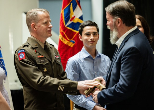 U.S. Army Col. Glenn A. Henke, commandant of the Air Defense Artillery School and deputy commanding officer of the Fires Center of Excellence and Fort Sill, is frocked to the rank of brigadier general during a ceremony at the Air Defense Artillery...