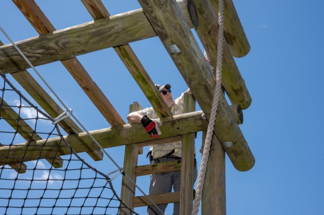 Bradley Hilton, U.S. Army Fort Leonard Wood Garrison Safety specialist, climbs the Tough One obstacle May 20 at Camp Crowder to make sure every part of the obstacle is checked during a safety inspection. Camp Crowder is a Missouri National Guard...