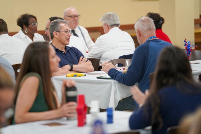 Several dozen Soldiers and Civilians gathered to reflect on building community through prayer during the Detroit Arsenal 2025 National Day of Prayer Breakfast.
