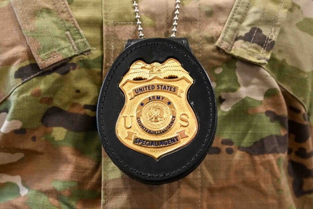 The new Army counterintelligence special agent badge is worn by a newly credentialed enlisted Soldier at a badge and credentials ceremony, McGill Training Center, Fort Meade, Maryland, April 3, 2025.