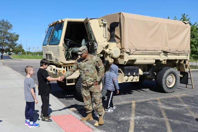 Students receive an Army experience during a local “Touch a truck” event