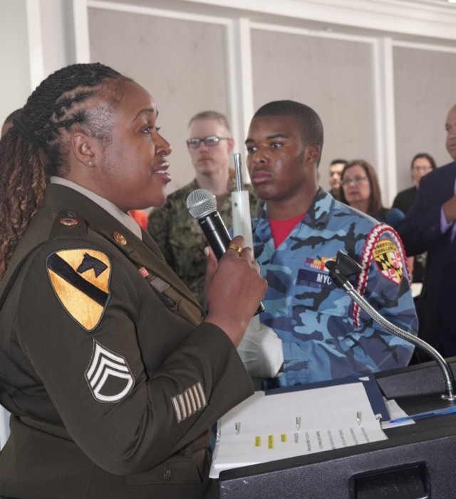 Staff Sgt. Larita Fullwood, the U.S. Army Communications-Electronics Command’s religious affairs non-commissioned officer in charge, sings the national anthem during the 48th annual Military Appreciation Luncheon at Top of the Bay on May 14, 2025.