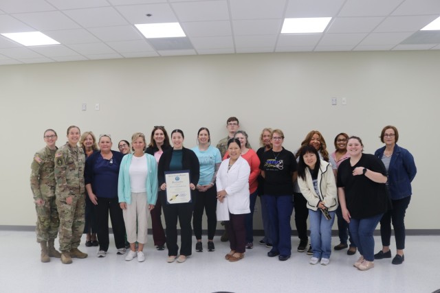 Kirk U.S. Army Health Clinic nursing staff and KUSAHC Commander Col. Lauris Trimble pose with a proclamation signed by Harford County Executive Bob Cassilly in recognition of National Nurses Week during a ceremony at the clinic’s Ortiz Training...