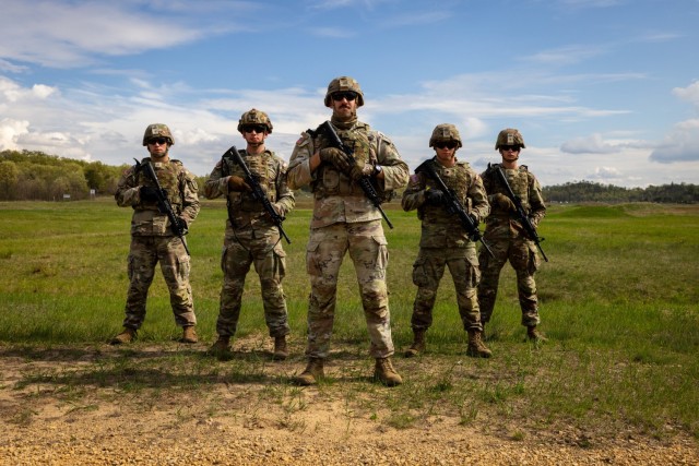 U.S. Army Reserve Best Squad Competitors, pose as a squad during the U.S. Army Reserve Command’s Best Squad Competition, Fort McCoy, Wis., May 13, 2025. Soldiers from around the nation gather to compete in the annual competition that brings...
