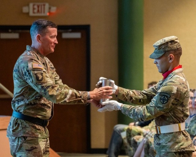 Outgoing AMD-CFT Director presented canister
