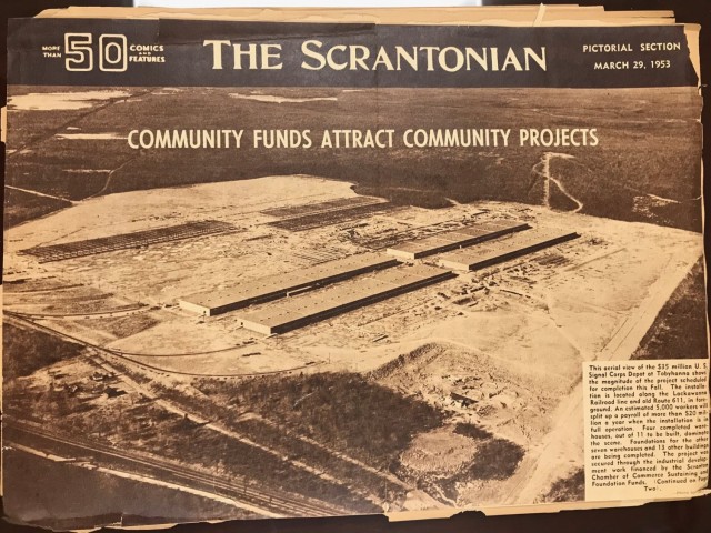 a newspaper clipping from March 29, 1953, edition of The Scrantonian - an aerial black and white photo of Tobyhanna Army Depot under construction