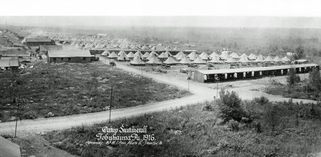 a black and white photo of Camp Summerall in Tobyhanna, Pennsylvania in 1916 - several tents and buildings are depicted