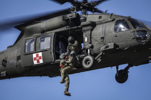 U.S. Army Reserve Soldiers of C. Co. 7-158th Aviation Regiment conduct casualty hoist training during Mojave Falcon 2025 at Fort Hunter Liggett, Calif., on May 30. Mojave Falcon 2025 is a multi-faceted first-of-its-kind Army Reserve training exercise that integrates Combat Support Training Exercise (CSTX), Global Medic, Quartermaster Liquid Logistics Exercise (QLLEX), Port Operations and Nationwide Move.