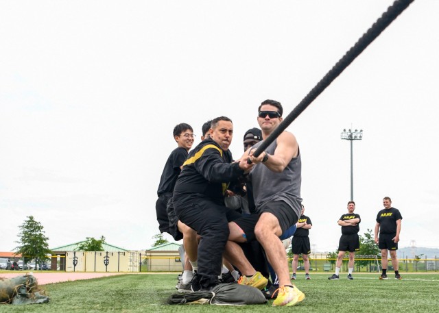 Service members participate in a game of tug-of-war hosted by Army Emergency Relief Chief Executive Officer Tony Grinston and AER members on Camp Humphreys, South Korea, May 19, 2025. Grinston and AER staff held several events over the course of...