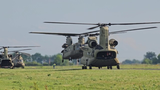 CH-47 Chinooks helicopters from the 101st Combat Aviation Brigade, 101st Airborne Division (Air Assault) and 82nd Combat Aviation Brigade, 82nd Airborne Division arrive at the Vicksburg-Tallulah Regional Airport at Vicksburg, Miss. for a Forward...