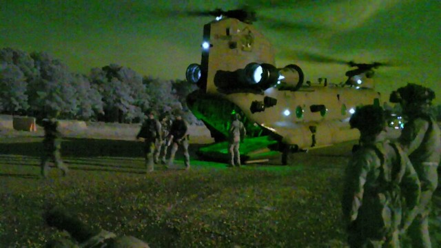 Soldiers from the 2nd Mobile Brigade Combat Team, 101st Airborne Division (Air Assault) Air Assault out of a CH-47 Chinook into the Joint Regional Training Center (JRTC) at Ft. Johnson, LA as part of a large scale, long range air assault (L2A2)...