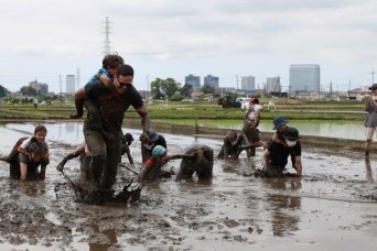 Rice-planting event near Camp Zama forges bond with neighboring community