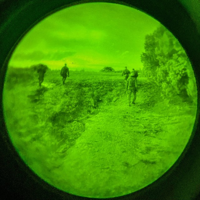 Troopers assigned to 1st Battalion, 8th Cavalry Regiment, 2nd Armored Brigade Combat Team, 1st Cavalry Division, walk towards their next point during the land navigation section of a best squad competiiton on Fort Cavazos, Texas, May 28, 2025. The...