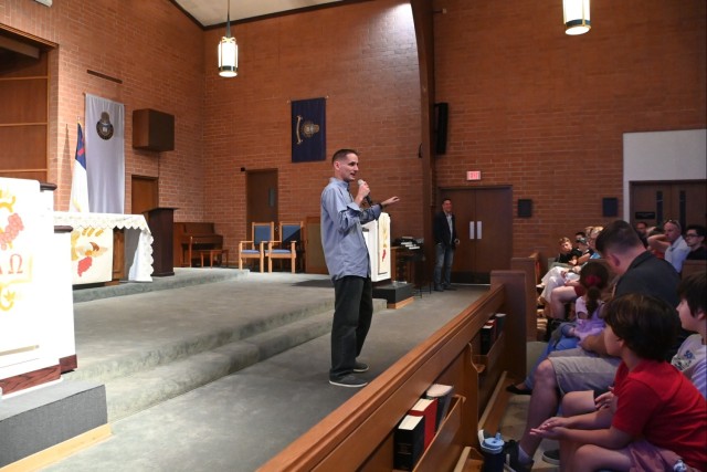 U.S. Army Yuma Proving Ground (YPG) Chaplain (Maj.) Ryan Pearse introduces Battle of Mogadishu veteran Jeff Struecker to a capacity crowd at the YPG Halo Chapel on June 4, 2025.
