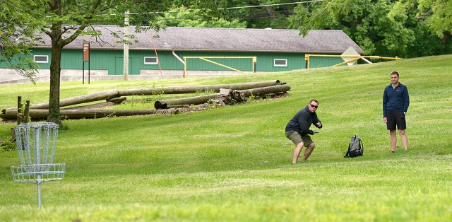 Albert LaFleur and Josiah Routhier, team name The Rose and Thorn, compete in the Strong B.A.N.D.S. Disc Golf Tournament May 24, 2025, at the Fort Leavenworth Disc Golf Course by Camp Conestoga, Fort Leavenworth, Kansas. Team The Rose and Thorn...