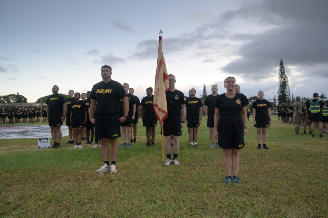 Schofield Barracks, Hawaii – Col. Rachel Sullivan, U.S. Army Garrison Hawaii commander, and members of her command team stand at attention during reveille June 9, 2025, on Weyand Field. The ceremony marked the official kickoff of Army Heritage...
