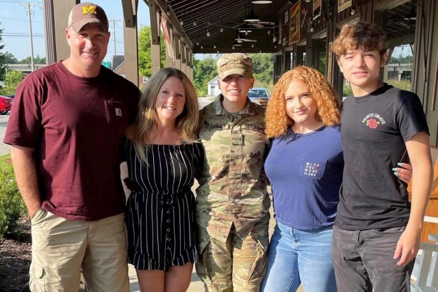 Fort Campbell High School, Ky., graduate Chase Cribbett, right, poses for a photo with his family, including his father, Army Sgt. 1st Class Don Cribbett. Cribbett will follow in his father's footsteps, entering the Army this fall.