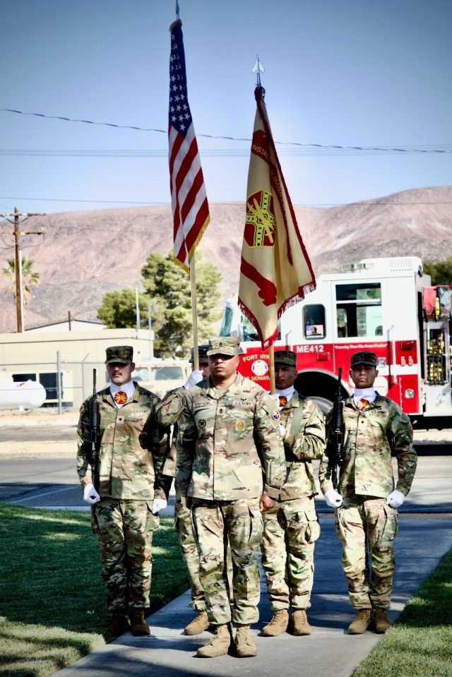 Command Sgt. Maj. Jerald J. Stephens, the acting Fort Irwin Garrison Command Sgt. Major, leads the ceremonial color guard during the unit change of command ceremony, June 10, 2025.