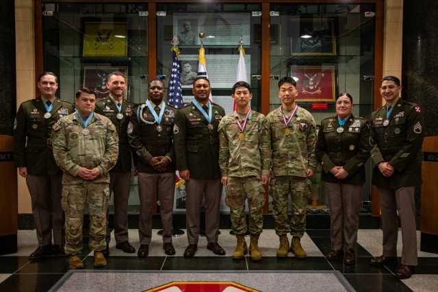 Newly inducted members of the Sergeant Audie Murphy Club pose for a group photo after the ceremony at Eighth Army Headquarters, USAG Humphreys, Oct. 22 2024. The SAMC honors NCOs who exemplify the values of leadership, caring for Soldiers, and...