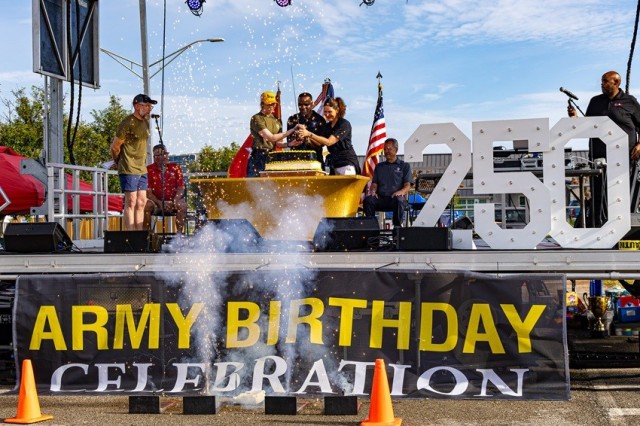 Garrison Commander Col. Erin Eike, Maj. Gen. Gavin Lawrence, Army Materiel Command’s deputy chief of staff for operations, and Civilian Aide to the Secretary of the Army Kris McBride cut Redstone’ 250th Army Birthday Cake. At far left is Ed...