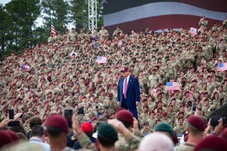 President Donald J. Trump poses for a photo in front of U.S. Army Soldiers during a ceremony for the Army’s 250th birthday on Fort Bragg, N.C., June 10, 2025. Trump joined service members, their families and the community to celebrate the semiquincentennial United States Army.