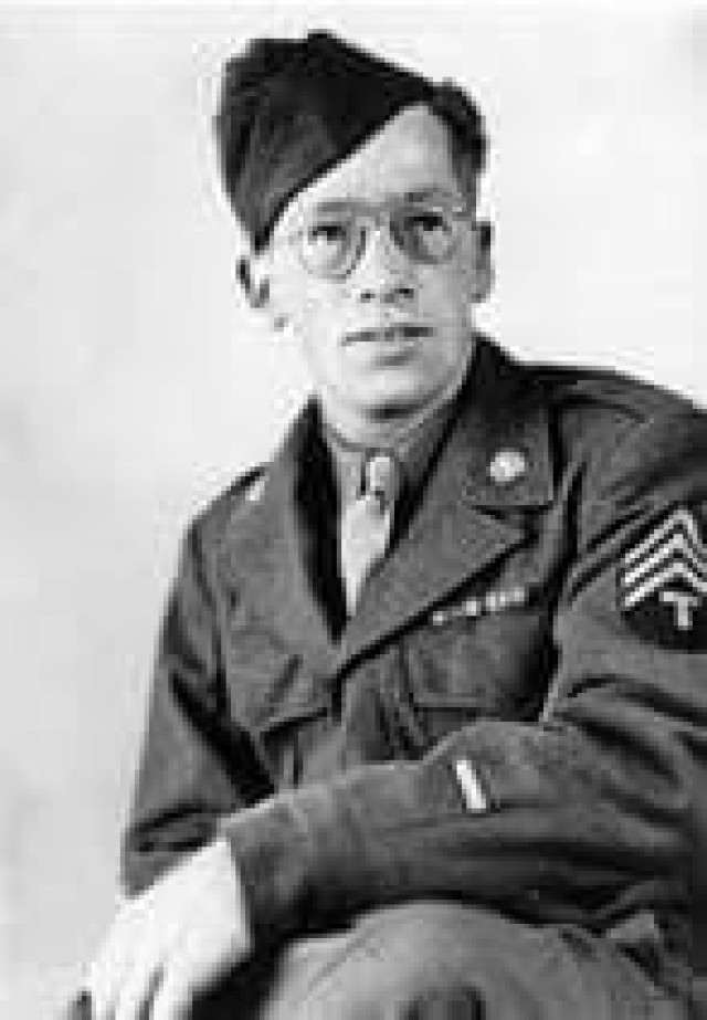 A black-and-white portrait of Sidney Austin Lane, a U.S. Army noncommissioned officer and World War II veteran, circa 1945. Lane helped liberate Nazi concentration camps in Europe, and later, contributed to the Apollo 11 mission as a civilian...