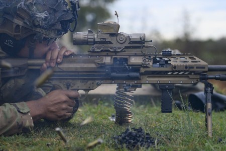 A U.S. Army Soldier assigned to Alpha Company, 1st Battalion, 506th Infantry Regiment, 101st Airborne Division (Air Assault) engages a target at roughly 800-meters on the enemy counterattack lane, during the Next Generation Squad Weapon system...