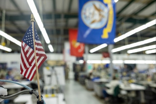 American flag posted near a fabrication line