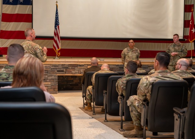 Maj. Gen. Christopher Beck, Maneuver Support Center of Excellence and Fort Leonard Wood commanding general (right) and MSCoE and Fort Leonard Wood Command Sgt. Maj. Jorge Arzabala (center) take questions and comments from attendees at a MSCoE Town...